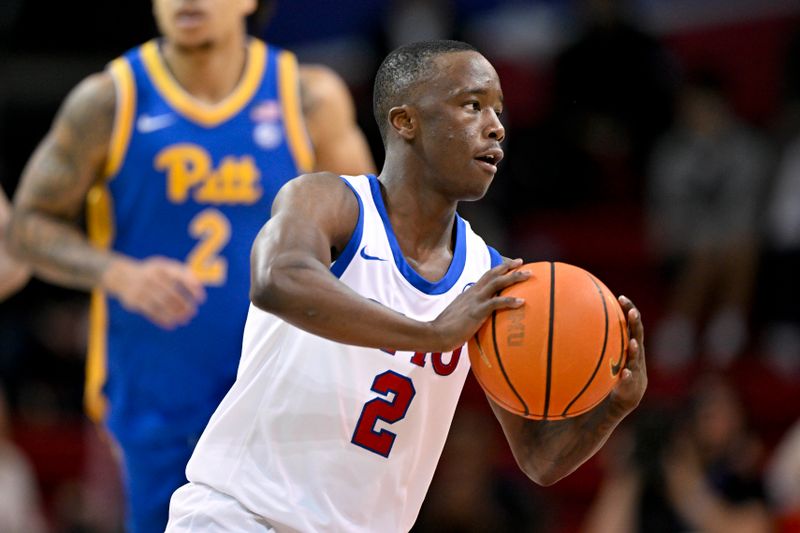 Feb 11, 2025; Dallas, Texas, USA; Southern Methodist Mustangs guard Boopie Miller (2) passes the ball during the second half against the Pittsburgh Panthers at Moody Coliseum. Mandatory Credit: Jerome Miron-Imagn Images