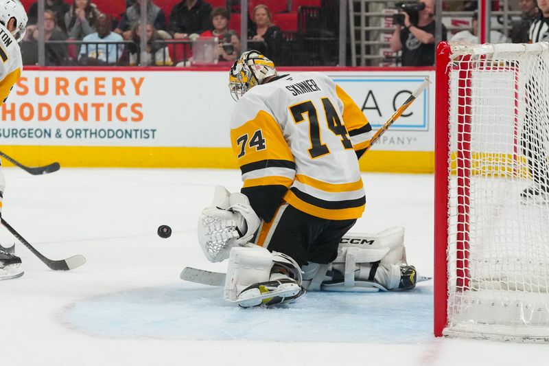 Mar 10, 2026; Raleigh, North Carolina, USA;  Pittsburgh Penguins goaltender Stuart Skinner (74) stops the shot against the Carolina Hurricanes during the third period at Lenovo Center. Mandatory Credit: James Guillory-Imagn Images