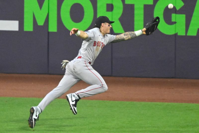 Jun 8, 2023; Cleveland, Ohio, USA; Boston Red Sox center fielder Jarren Duran (16) can t catch up to a fly ball in the sixth inning against the Cleveland Guardians at Progressive Field. Mandatory Credit: David Richard-USA TODAY Sports