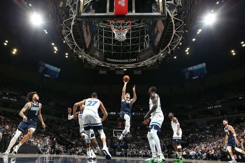 MINNEAPOLIS, MN -  OCTOBER 29: Luka Doncic #77 of the Dallas Mavericks shoots the ball during the game against the Minnesota Timberwolves on October 29, 2024 at Target Center in Minneapolis, Minnesota. NOTE TO USER: User expressly acknowledges and agrees that, by downloading and or using this Photograph, user is consenting to the terms and conditions of the Getty Images License Agreement. Mandatory Copyright Notice: Copyright 2024 NBAE (Photo by David Sherman/NBAE via Getty Images)