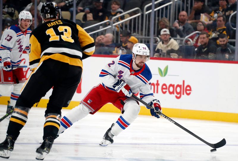 Oct 9, 2024; Pittsburgh, Pennsylvania, USA;  New York Rangers center Filip Chytil (72) skates up ice with the puck against the Pittsburgh Penguins during the second period at PPG Paints Arena. Mandatory Credit: Charles LeClaire-Imagn Images