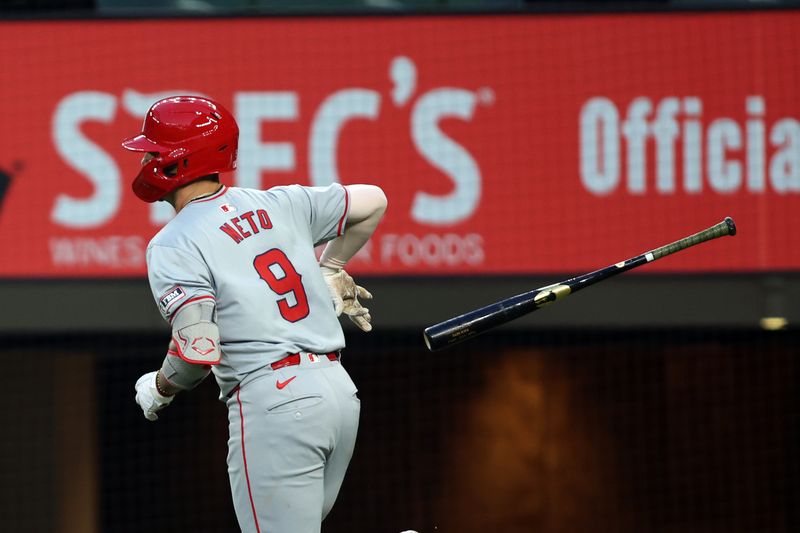 May 17, 2024; Arlington, Texas, USA; Los Angeles Angels shortstop Zach Neto (9) tosses the bat after hitting a two-run home run in the fourth inning against the Texas Rangers at Globe Life Field. Mandatory Credit: Tim Heitman-USA TODAY Sports