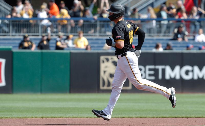 Sep 8, 2024; Pittsburgh, Pennsylvania, USA;  Pittsburgh Pirates catcher Joey Bart (14) circles the bases on a two run home run against the Washington Nationals during the first inning at PNC Park. Mandatory Credit: Charles LeClaire-Imagn Images