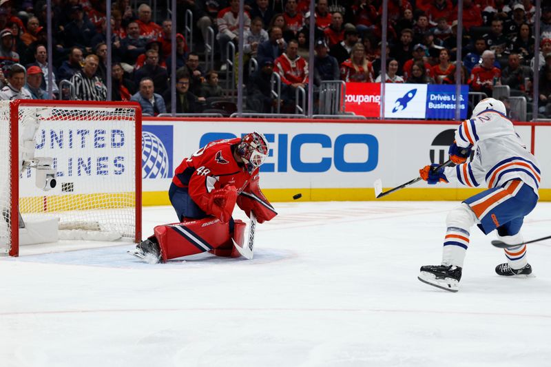 Nov 19, 2025; Washington, District of Columbia, USA; Washington Capitals goaltender Logan Thompson (48) makes a save against on Edmonton Oilers right wing Vasily Podkolzin (92) during the second period at Capital One Arena. Mandatory Credit: Geoff Burke-Imagn Images