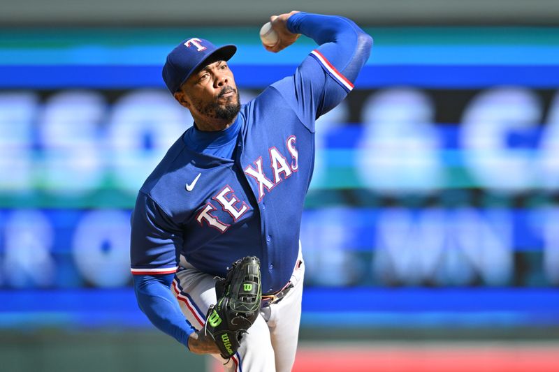 Aug 27, 2023; Minneapolis, Minnesota, USA; Texas Rangers relief pitcher Aroldis Chapman (45) throws a pitch during the ninth inning against the Minnesota Twins at Target Field. Mandatory Credit: Jeffrey Becker-USA TODAY Sports