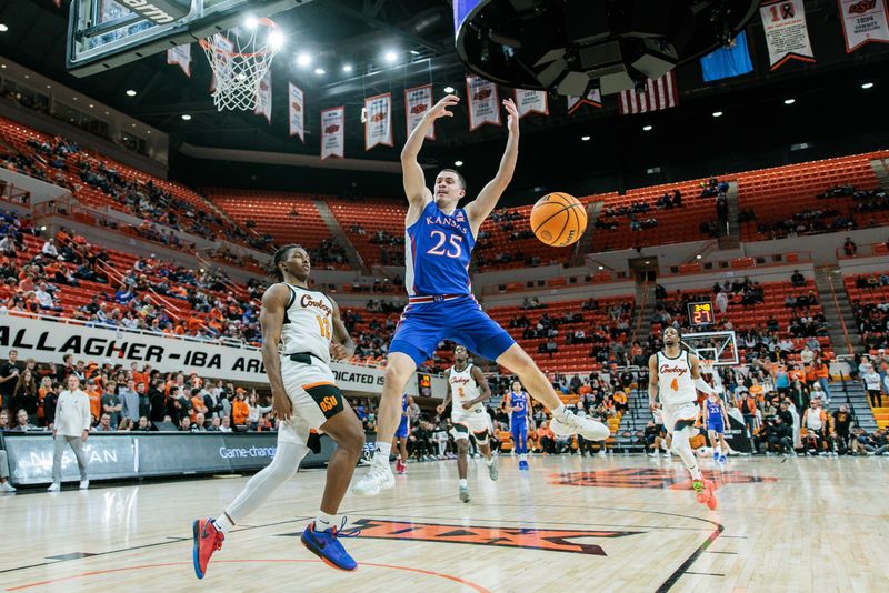 Jan 16, 2024; Stillwater, Oklahoma, USA; Kansas Jayhawks guard Nicolas Timberlake (25) loses control of the ball during the second half against the Oklahoma State Cowboys at Gallagher-Iba Arena. Mandatory Credit: William Purnell-USA TODAY Sports