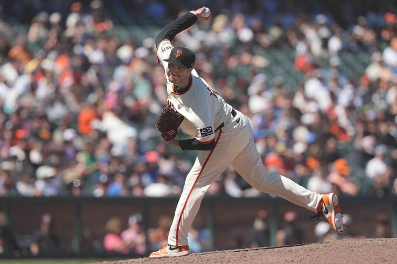 Jun 27, 2024; San Francisco, California, USA; San Francisco Giants relief pitcher Luke Jackson (77) throws a pitch against the Chicago Cubs during the tenth inning at Oracle Park. Mandatory Credit: Darren Yamashita-USA TODAY Sports