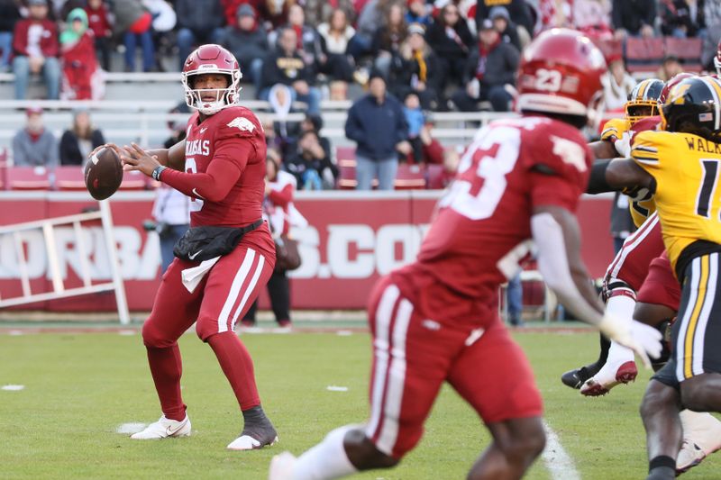 Nov 24, 2023; Fayetteville, Arkansas, USA; Arkansas Razorbacks quarterback Jacolby Criswell (6) passes the ball during the second quarter against the Missouri Tigers at Donald W. Reynolds Razorback Stadium. Mandatory Credit: Nelson Chenault-USA TODAY Sports