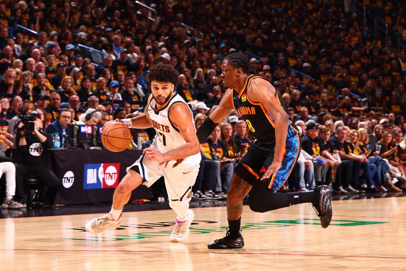 OKLAHOMA CITY, OK - MAY 5:  Jamal Murray #27 of the Denver Nuggets drives to the basket during the game against the Oklahoma City Thunder during Round Two Game One of the 2025 NBA Playoffs on MAY 5, 2025 at Paycom Center in Oklahoma City, Oklahoma. NOTE TO USER: User expressly acknowledges and agrees that, by downloading and or using this photograph, User is consenting to the terms and conditions of the Getty Images License Agreement. Mandatory Copyright Notice: Copyright 2025 NBAE (Photo by Zach Beeker/NBAE via Getty Images)