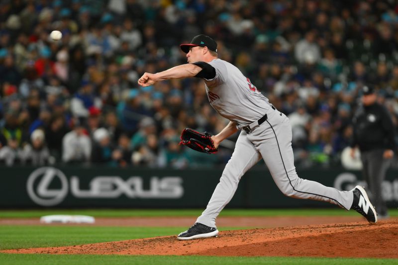 Apr 27, 2024; Seattle, Washington, USA; Arizona Diamondbacks relief pitcher Joe Mantiply (35) pitches to the Seattle Mariners during the seventh inning at T-Mobile Park. Mandatory Credit: Steven Bisig-USA TODAY Sports