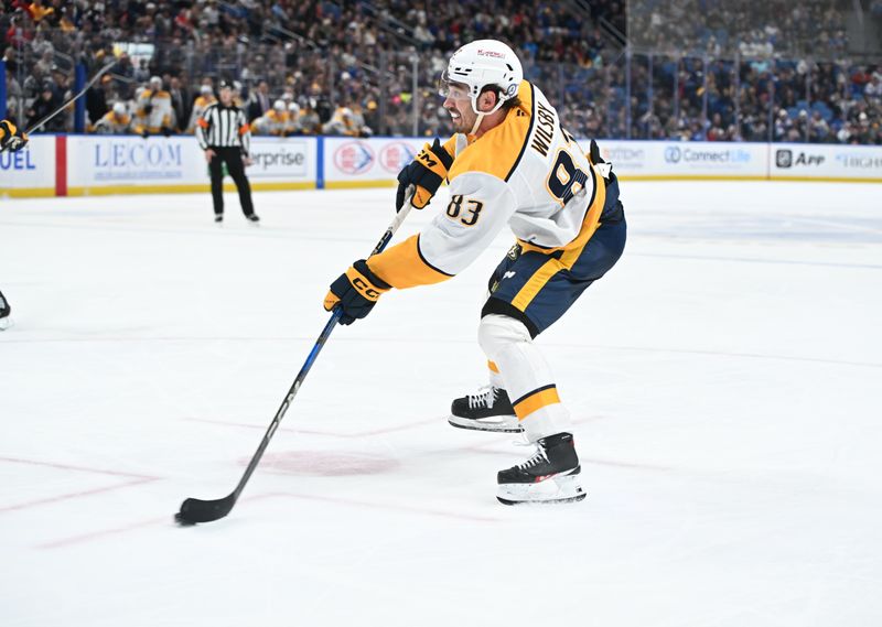 Jan 31, 2025; Buffalo, New York, USA; Nashville Predators defenseman Adam Wilsby (83) looks to take a shot against the Buffalo Sabres in the third period at the KeyBank Center. Mandatory Credit: Mark Konezny-Imagn Images