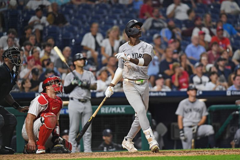 Jul 29, 2024; Philadelphia, Pennsylvania, USA;  New York Yankees third baseman Jazz Chisholm, Jr (13) watches his  home run during the ninth inning against the Philadelphia Phillies at Citizens Bank Park. Mandatory Credit: Eric Hartline-USA TODAY Sports
