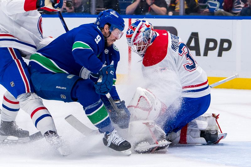 Mar 21, 2024; Vancouver, British Columbia, CAN; Vancouver Canucks forward J.T. Miller (9) collides with Montreal Canadiens goalie Sam Montembeault (35) in the first period at Rogers Arena. Mandatory Credit: Bob Frid-USA TODAY Sports