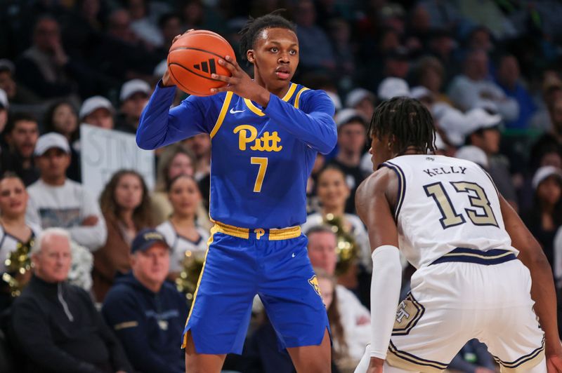 Jan 23, 2024; Atlanta, Georgia, USA; Pittsburgh Panthers guard Carlton Carrington (7) handles the ball against the Georgia Tech Yellow Jackets in the first half at McCamish Pavilion. Mandatory Credit: Brett Davis-USA TODAY Sports