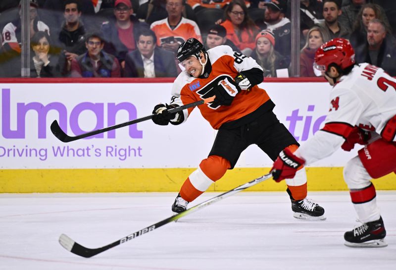 Nov 28, 2023; Philadelphia, Pennsylvania, USA; Philadelphia Flyers right wing Cam Atkinson (89) passes the puck against the Carolina Hurricanes in the first period at Wells Fargo Center. Mandatory Credit: Kyle Ross-USA TODAY Sports