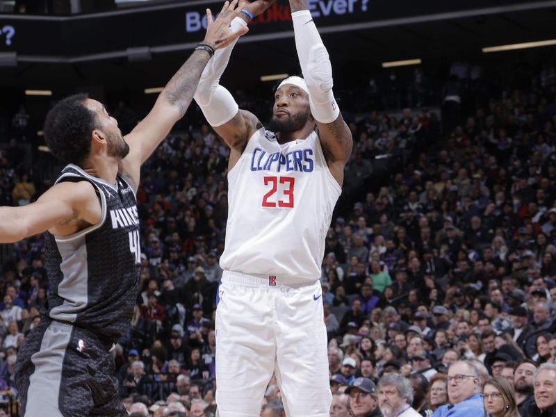 SACRAMENTO, CA - MARCH 3: Robert Covington #23 of the LA Clippers shoots a three point basket during the game against the Sacramento Kings on March 3, 2023 at Golden 1 Center in Sacramento, California. NOTE TO USER: User expressly acknowledges and agrees that, by downloading and or using this Photograph, user is consenting to the terms and conditions of the Getty Images License Agreement. Mandatory Copyright Notice: Copyright 2023 NBAE (Photo by Rocky Widner/NBAE via Getty Images)