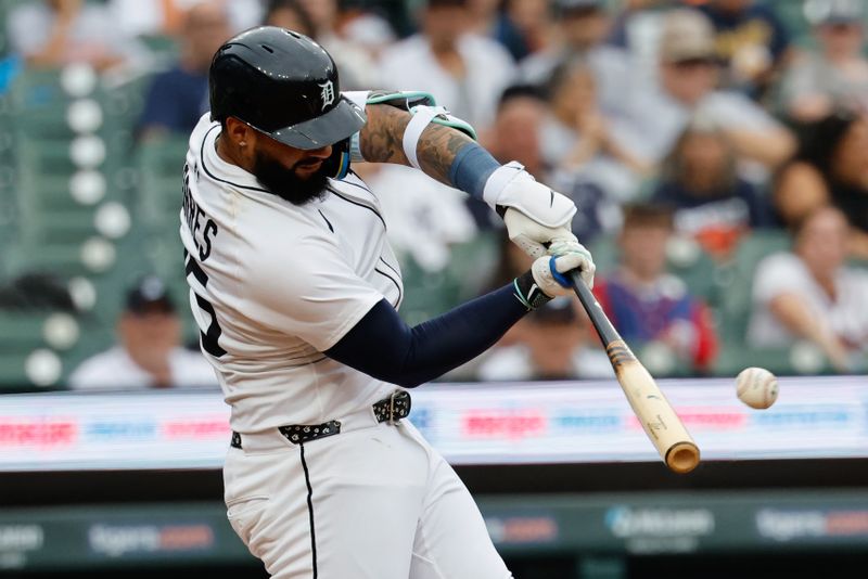 Sep 21, 2025; Detroit, Michigan, USA;  Detroit Tigers second base Gleyber Torres (25) hits an RBI double in the ninth inning against the Atlanta Braves at Comerica Park. Mandatory Credit: Rick Osentoski-Imagn Images