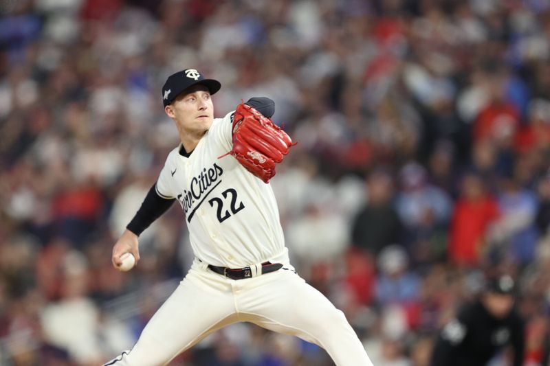 Oct 11, 2023; Minneapolis, Minnesota, USA; Minnesota Twins relief pitcher Griffin Jax (22) pitches in the in the seventh inning against the Houston Astros during game four of the ALDS for the 2023 MLB playoffs at Target Field. Mandatory Credit: Jesse Johnson-USA TODAY Sports