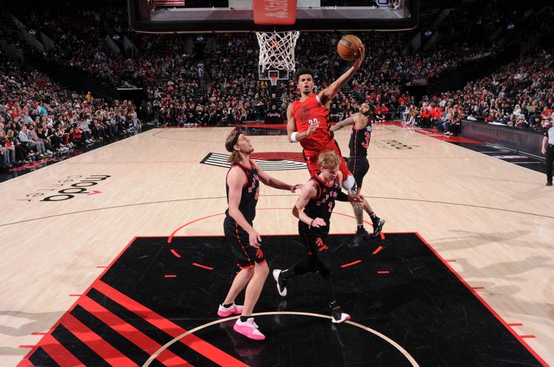 PORTLAND, OR - MARCH 9: Toumani Camara #33 of the Portland Trail Blazers drives to the basket during the game against the Toronto Raptors on March 9, 2024 at the Moda Center Arena in Portland, Oregon. NOTE TO USER: User expressly acknowledges and agrees that, by downloading and or using this photograph, user is consenting to the terms and conditions of the Getty Images License Agreement. Mandatory Copyright Notice: Copyright 2024 NBAE (Photo by Cameron Browne/NBAE via Getty Images)