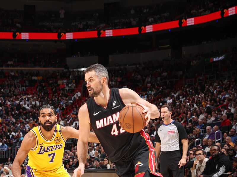 MIAMI, FL - DECEMBER 4: Kevin Love #42 of the Miami Heat handles the ball during the game against the Los Angeles Lakers on December 4, 2024 at Kaseya Center in Miami, Florida. NOTE TO USER: User expressly acknowledges and agrees that, by downloading and or using this Photograph, user is consenting to the terms and conditions of the Getty Images License Agreement. Mandatory Copyright Notice: Copyright 2024 NBAE (Photo by Joe Murphy/NBAE via Getty Images)