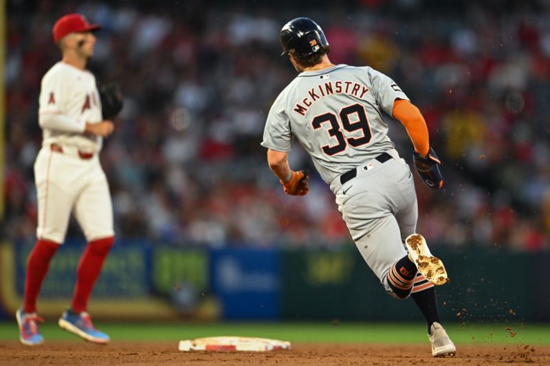 Jun 29, 2024; Anaheim, California, USA; Detroit Tigers shortstop Zach McKinstry (39) runs to second base against the Los Angeles Angels during the fourth inning at Angel Stadium. Mandatory Credit: Jonathan Hui-USA TODAY Sports