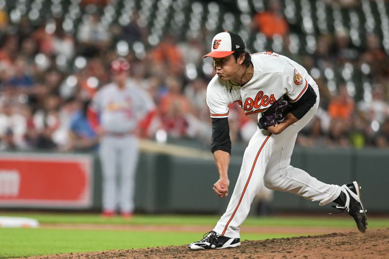 Sep 13, 2023; Baltimore, Maryland, USA; Baltimore Orioles relief pitcher Shintaro Fujinami (14) throws a ninth inning pitch against the St. Louis Cardinals  at Oriole Park at Camden Yards. Mandatory Credit: Tommy Gilligan-USA TODAY Sports