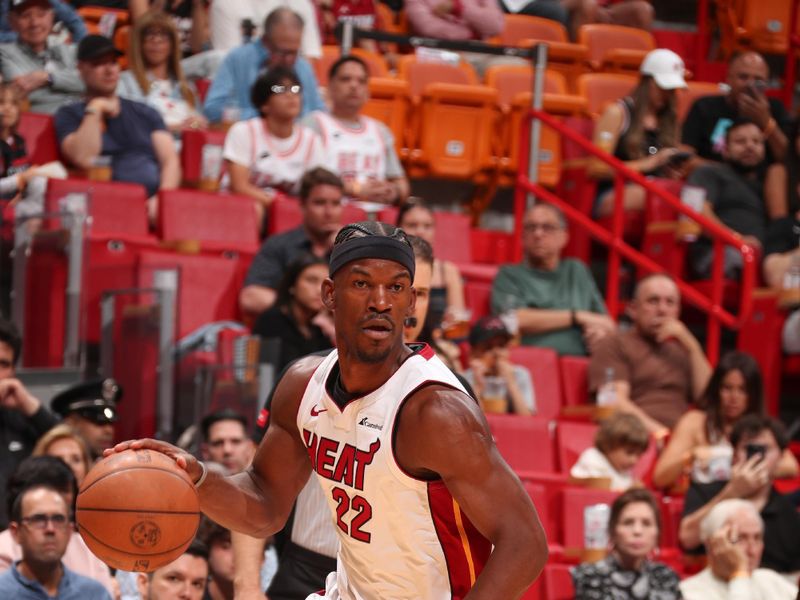 MIAMI, FL - APRIL 14:  Jimmy Butler #22 of the Miami Heat goes to the basket during the game on April 14, 2024 at Kaseya Center in Miami, Florida. NOTE TO USER: User expressly acknowledges and agrees that, by downloading and or using this Photograph, user is consenting to the terms and conditions of the Getty Images License Agreement. Mandatory Copyright Notice: Copyright 2024 NBAE (Photo by Issac Baldizon/NBAE via Getty Images)