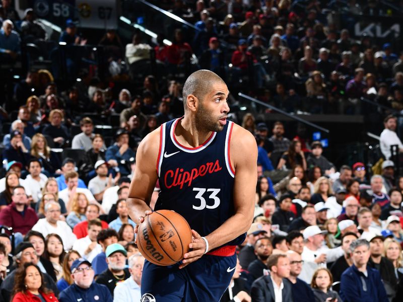 INGLEWOOD, CA - APRIL 26:  Nicolas Batum #33 of the LA Clippers handles the ball during Round One, Game Four of the 2025 NBA Playoffs against the Denver Nuggets on April 26, 2025 at Intuit Dome in Los Angeles, California. NOTE TO USER: User expressly acknowledges and agrees that, by downloading and/or using this Photograph, user is consenting to the terms and conditions of the Getty Images License Agreement. Mandatory Copyright Notice: Copyright 2025 NBAE (Photo by Juan Ocampo/NBAE via Getty Images)