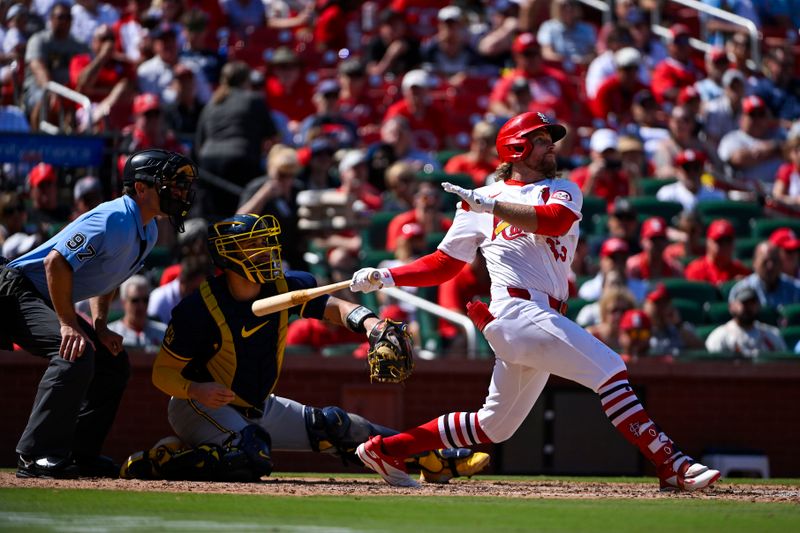 Aug 22, 2024; St. Louis, Missouri, USA;  St. Louis Cardinals second baseman Brendan Donovan (33) hits a one run single against the Milwaukee Brewers during the seventh inning at Busch Stadium. Mandatory Credit: Jeff Curry-USA TODAY Sports