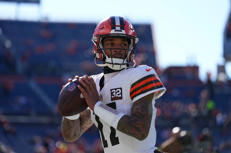 Cleveland Browns quarterback Dorian Thompson-Robinson warms up before the start of an NFL football game between the Cleveland Browns and the Denver Broncos on Sunday, Nov. 26, 2023, in Denver. (AP Photo/Jack Dempsey)