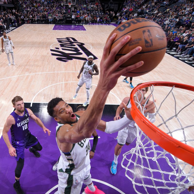 SACRAMENTO, CA - MARCH 12: Giannis Antetokounmpo #34 of the Milwaukee Bucks dunks the ball during the game against the Sacramento Kings on March 12, 2024 at Golden 1 Center in Sacramento, California. NOTE TO USER: User expressly acknowledges and agrees that, by downloading and or using this Photograph, user is consenting to the terms and conditions of the Getty Images License Agreement. Mandatory Copyright Notice: Copyright 2024 NBAE (Photo by Rocky Widner/NBAE via Getty Images)