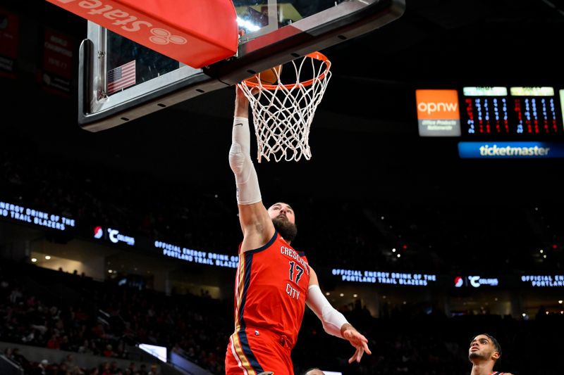 PORTLAND, OREGON - APRIL 09: Jonas Valanciunas #17 of the New Orleans Pelicans dunks during the second quarter of the game against the Portland Trail Blazers at the Moda Center on April 09, 2024 in Portland, Oregon. The New Orleans Pelicans won 110-100. NOTE TO USER: User expressly acknowledges and agrees that, by downloading and or using this photograph, User is consenting to the terms and conditions of the Getty Images License Agreement. (Photo by Alika Jenner/Getty Images)