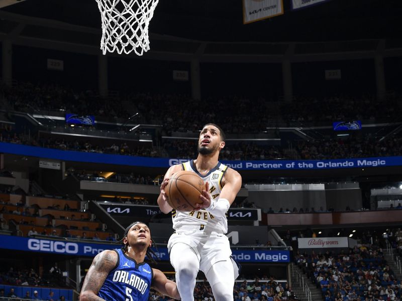 ORLANDO, FL - MARCH 10: Tyrese Haliburton #0 of the Indiana Pacers goes to the basket during the game on March 10, 2024 at Amway Center in Orlando, Florida. NOTE TO USER: User expressly acknowledges and agrees that, by downloading and or using this photograph, User is consenting to the terms and conditions of the Getty Images License Agreement. Mandatory Copyright Notice: Copyright 2024 NBAE (Photo by Fernando Medina/NBAE via Getty Images)