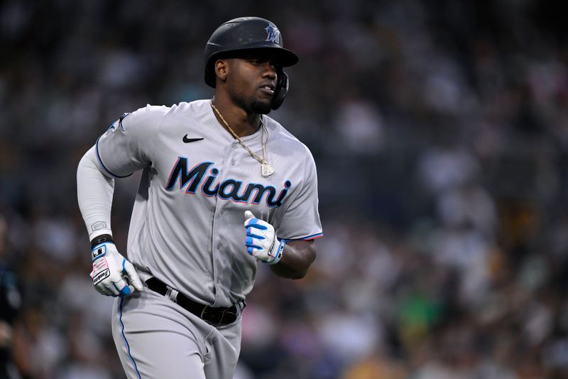 Aug 22, 2023; San Diego, California, USA; Miami Marlins designated hitter Jorge Soler (12) rounds the bases after hitting a home run against the San Diego Padres during the third inning at Petco Park. Mandatory Credit: Orlando Ramirez-USA TODAY Sports