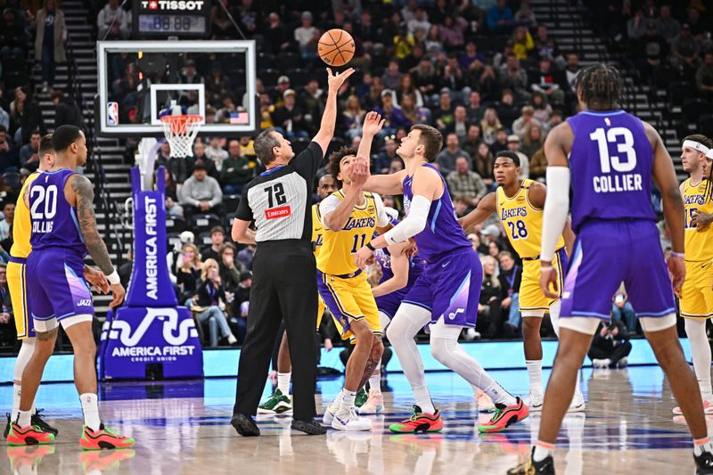 SALT LAKE CITY, UT - FEBRUARY 12: Jaxson Hayes #11 of the Los Angeles Lakers and Walker Kessler #24 of the Utah Jazz go up for the opening tip off on February 12, 2025 at Delta Center in Salt Lake City, Utah. NOTE TO USER: User expressly acknowledges and agrees that, by downloading and or using this Photograph, User is consenting to the terms and conditions of the Getty Images License Agreement. Mandatory Copyright Notice: Copyright 2025 NBAE (Photo by Jamie Sabau/NBAE via Getty Images)