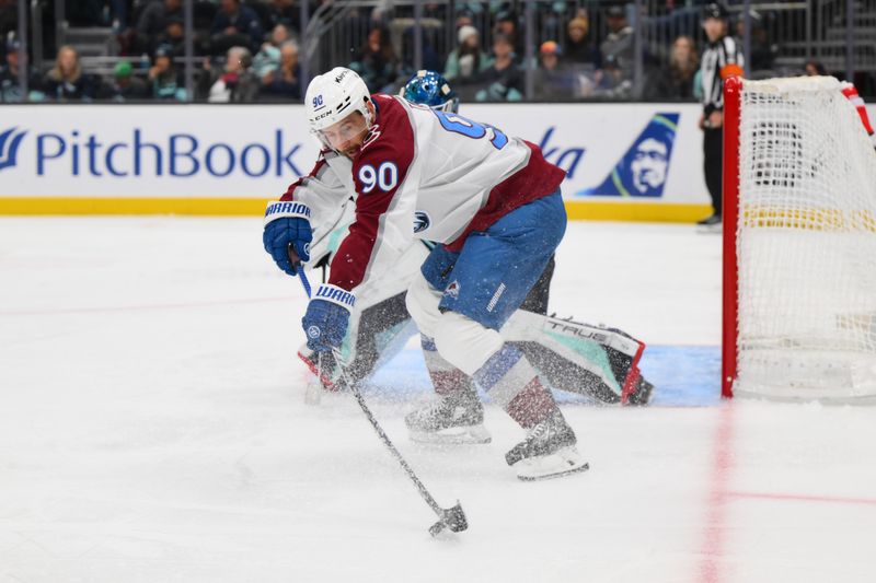 Nov 13, 2023; Seattle, Washington, USA; Colorado Avalanche left wing Tomas Tatar (90) receives a pass against the Seattle Kraken during the third period at Climate Pledge Arena. Mandatory Credit: Steven Bisig-USA TODAY Sports