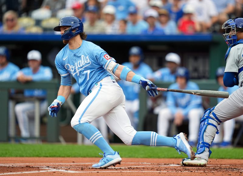 Jul 28, 2024; Kansas City, Missouri, USA; Kansas City Royals shortstop Bobby Witt Jr. (7) hits a single against the Chicago Cubs during the first inning at Kauffman Stadium. Mandatory Credit: Jay Biggerstaff-USA TODAY Sports