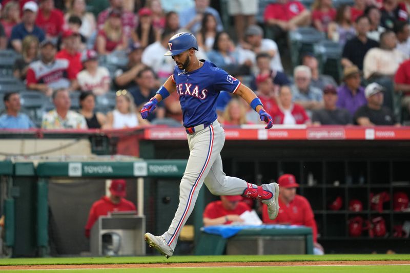 Jul 10, 2024; Anaheim, California, USA; Texas Rangers center fielder Leody Taveras (3) runs the bases after hitting a two-run home run in the fifth inning against the Los Angeles Angels at Angel Stadium. Mandatory Credit: Kirby Lee-USA TODAY Sports