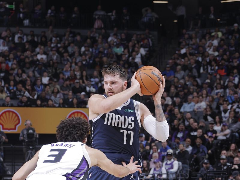 SACRAMENTO, CA - MARCH 29:  Luka Doncic #77 of the Dallas Mavericks handles the ball during the game on March 29, 2024 at Golden 1 Center in Sacramento, California. NOTE TO USER: User expressly acknowledges and agrees that, by downloading and or using this Photograph, user is consenting to the terms and conditions of the Getty Images License Agreement. Mandatory Copyright Notice: Copyright 2024 NBAE (Photo by Rocky Widner/NBAE via Getty Images)