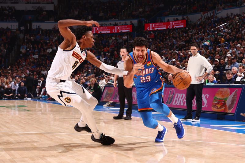 OKLAHOMA CITY, OK - JANUARY 31: Vasilije Micic #29 of the Oklahoma City Thunder dribbles the ball during the game against the Denver Nuggets on January 31, 2024 at Paycom Arena in Oklahoma City, Oklahoma. NOTE TO USER: User expressly acknowledges and agrees that, by downloading and or using this photograph, User is consenting to the terms and conditions of the Getty Images License Agreement. Mandatory Copyright Notice: Copyright 2024 NBAE (Photo by Zach Beeker/NBAE via Getty Images)