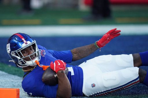 New York Giants wide receiver Malik Nabers (1) catches the pass for a touchdown during an NFL football game against the New Orlean Saints, Sunday, Nov. 17, 2024 in East Rutherford, N.J. The Saints defeated the Giants 14-11. (AP Photo/Vera Nieuwenhuis)