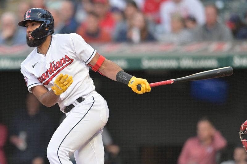 May 26, 2023; Cleveland, Ohio, USA; Cleveland Guardians shortstop Amed Rosario (1) hits an RBI double during the fifth inning against the St. Louis Cardinals at Progressive Field. Mandatory Credit: Ken Blaze-USA TODAY Sports