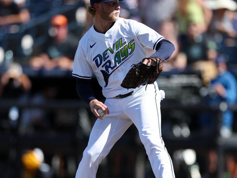 Apr 19, 2025; Tampa, Florida, USA; Tampa Bay Rays starting pitcher Shane Baz (11) throws a pitch against the New York Yankees in the first inning  at George M. Steinbrenner Field. Mandatory Credit: Nathan Ray Seebeck-Imagn Images