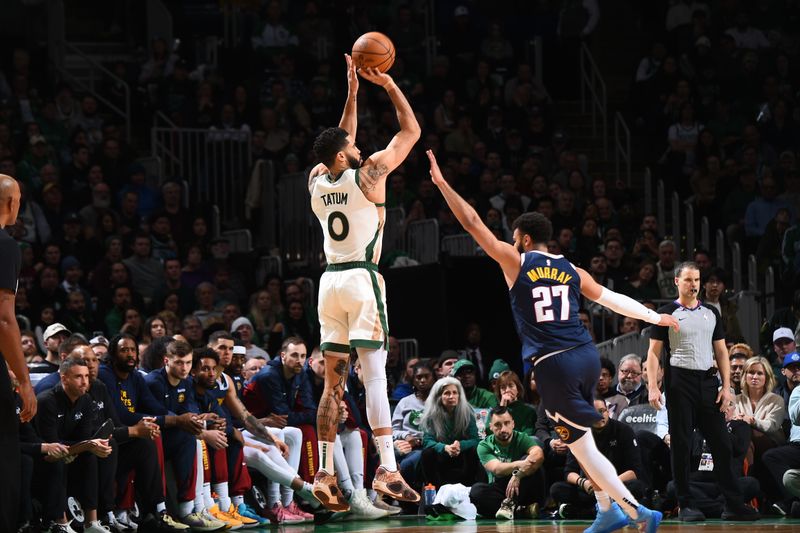 BOSTON, MA - JANUARY 19:  Jayson Tatum #0 of the Boston Celtics shoots the ball during the game against the Denver Nuggets on January 19, 2024 at the TD Garden in Boston, Massachusetts. NOTE TO USER: User expressly acknowledges and agrees that, by downloading and or using this photograph, User is consenting to the terms and conditions of the Getty Images License Agreement. Mandatory Copyright Notice: Copyright 2024 NBAE  (Photo by Brian Babineau/NBAE via Getty Images)