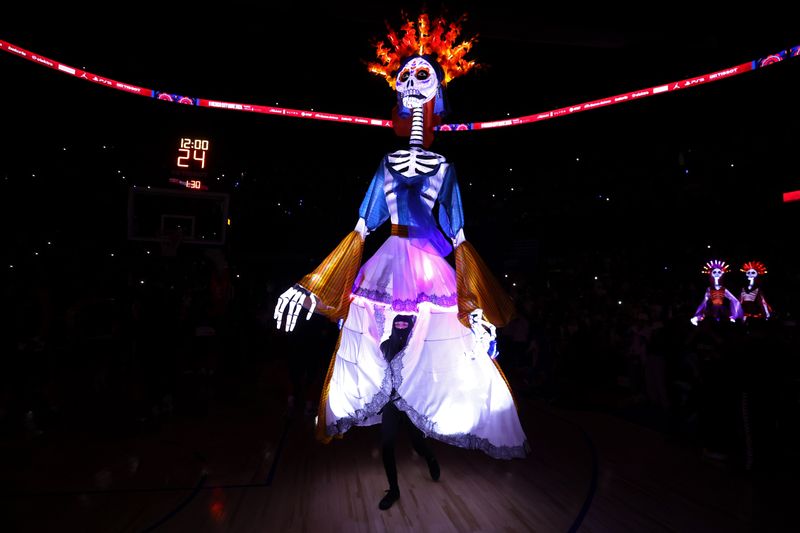 MEXICO CITY, MX - NOVEMBER 2: Performers walk on the court during the game between the Miami Heat and the Washington Wizards as part of 2024 NBA Mexico Games on November 2, 2024 in Mexico City, Mexico at Arena Ciudad de Mexico. NOTE TO USER: User expressly acknowledges and agrees that, by downloading and or using this photograph, User is consenting to the terms and conditions of the Getty Images License Agreement. Mandatory Copyright Notice: Copyright 2024 NBAE (Photo by Stephen Gosling/NBAE via Getty Images)