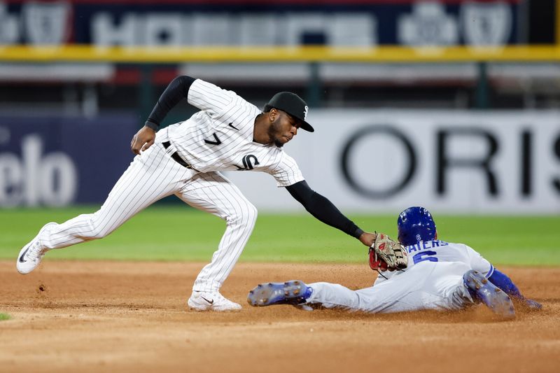 Sep 13, 2023; Chicago, Illinois, USA; Kansas City Royals center fielder Drew Waters (6) steals second base as Chicago White Sox shortstop Tim Anderson (7) applies late tag during the seventh inning at Guaranteed Rate Field. Mandatory Credit: Kamil Krzaczynski-USA TODAY Sports