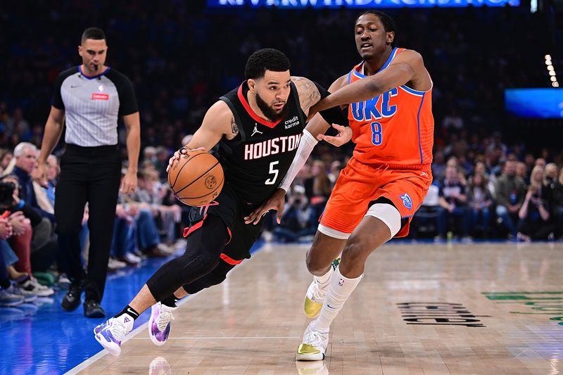 OKLAHOMA CITY, OKLAHOMA - MARCH 27: Fred VanVleet #5 of the Houston Rockets drives against Jalen Williams #8 of the Oklahoma City Thunder during the first half at Paycom Center on March 27, 2024 in Oklahoma City, Oklahoma. NOTE TO USER: User expressly acknowledges and agrees that, by downloading and or using this Photograph, user is consenting to the terms and conditions of the Getty Images License Agreement. (Photo by Joshua Gateley/Getty Images)