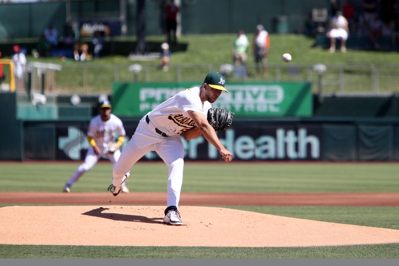 Sep 14, 2025; West Sacramento, California, USA; Athletics starting pitcher Luis Morales (58) throws a pitch against the Cincinnati Reds during the first inning at Sutter Health Park. Mandatory Credit: Dennis Lee-Imagn Images