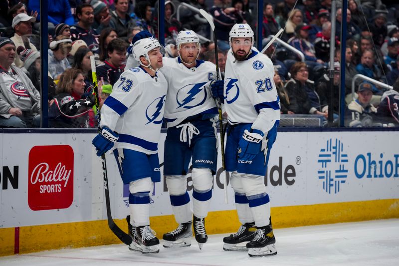 Nov 2, 2023; Columbus, Ohio, USA;  Tampa Bay Lightning center Steven Stamkos (91) celebrates with teammates after scoring a goal against the Columbus Blue Jackets in the second period at Nationwide Arena. Mandatory Credit: Aaron Doster-USA TODAY Sports