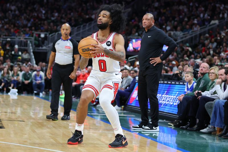 MILWAUKEE, WISCONSIN - OCTOBER 25: Coby White #0 of the Chicago Bulls takes a three point shot during the first half of a game against the Milwaukee Bucks at Fiserv Forum on October 25, 2024 in Milwaukee, Wisconsin. NOTE TO USER: User expressly acknowledges and agrees that, by downloading and or using this photograph, User is consenting to the terms and conditions of the Getty Images License Agreement. (Photo by Stacy Revere/Getty Images)